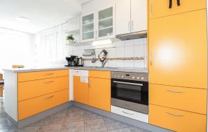 Η κουζίνα ή μικρή κουζίνα στο Ferienwohnung Mit Terrasse