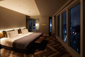 Voodi või voodid majutusasutuse SHIBUYA STREAM HOTEL formerly Shibuya Stream Excel Hotel Tokyu toas