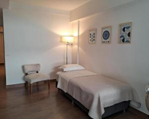 Recoleta, departamento de lujo a estrenar客房内的一张或多张床位