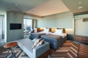 Voodi või voodid majutusasutuse SHIBUYA STREAM HOTEL formerly Shibuya Stream Excel Hotel Tokyu toas