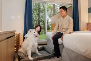 Domácí mazlíčci ubytovaní s hosty v ubytování KAMENOI HOTEL Kamogawa