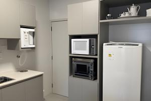 Η κουζίνα ή μικρή κουζίνα στο Apartamento Central em Araxá