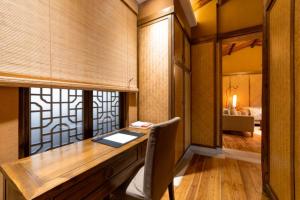 Postel nebo postele na pokoji v ubytování Ganzhou Banjiangxia Homestay