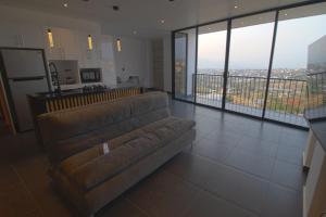 Ruang duduk di Palmas luxury apartment 102