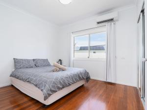 Cama o camas de una habitación en Thorneside seaside dream home near the blue sea