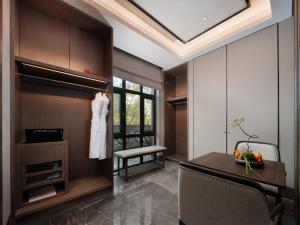 TV a/nebo společenská místnost v ubytování Song Hotel Chengdu Qingcheng