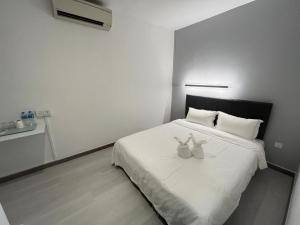 Letto o letti in una camera di Self Check-In - Havona Hotel Plentong