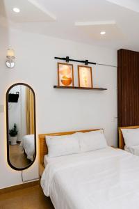 Katil atau katil-katil dalam bilik di 05 Đoàn Thị Điểm Hotel