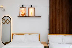 Katil atau katil-katil dalam bilik di 05 Đoàn Thị Điểm Hotel