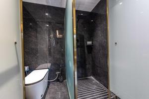 Vannituba majutusasutuses 万仕达酒店Vanisdar Hotel