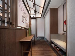 Postel nebo postele na pokoji v ubytování Song Hotel Chengdu Qingcheng