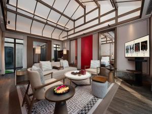 Posezení v ubytování Song Hotel Chengdu Qingcheng