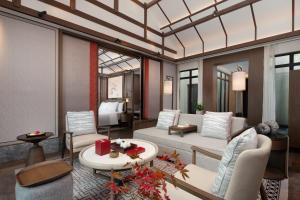 Posezení v ubytování Song Hotel Chengdu Qingcheng