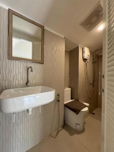 Koupelna v ubytování Sabaii Bay Resort