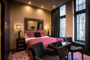 Postel nebo postele na pokoji v ubytování Hotel Sebastians