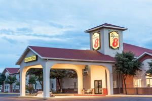 a gas station with a sign on top of it at Super 8 by Wyndham Willcox in Willcox