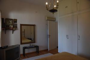 Кровать или кровати в номере Kiveri Traditional Villa