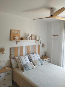 Postel nebo postele na pokoji v ubytování Apartamento rusticchic con terraza