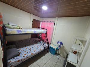 Postel nebo postele na pokoji v ubytování Casas Isa- Pura Vida