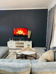 Posezení v ubytování Ekhaya Manor
