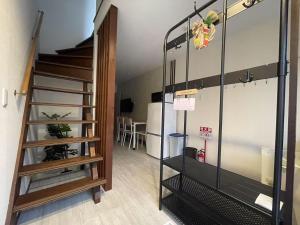 Postel nebo postele na pokoji v ubytování 長橋屋