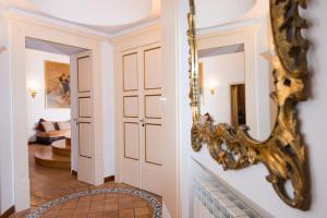 Postel nebo postele na pokoji v ubytování B&B Maiurè