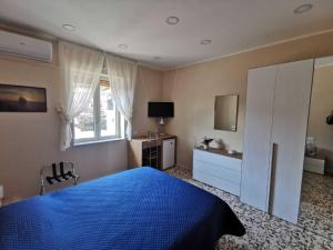 Postel nebo postele na pokoji v ubytování Sailorsroom