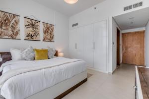 Fotografie z fotogalerie ubytování Luxury Azizi Mina Beachfront Apartments v Dubaji