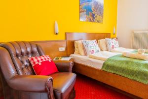 Ένα ή περισσότερα κρεβάτια σε δωμάτιο στο Hotel garni Weberhäusl