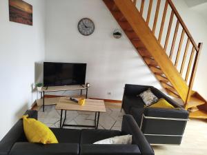Μια τηλεόραση ή/και κέντρο ψυχαγωγίας στο Appartement 4 Personnes Quaedypre