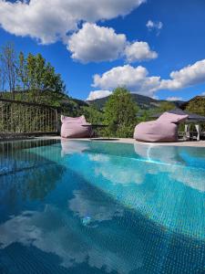 Bazén v ubytování ALMMONTE SENSUM SUITES Boutique Hotel nebo v jeho okolí