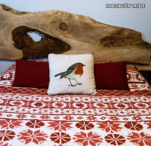 Postel nebo postele na pokoji v ubytování Hostal Rural Sant Climent