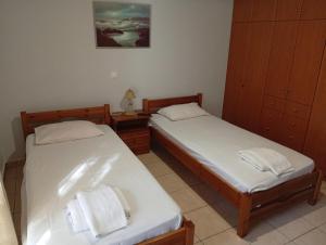 Letto o letti in una camera di Lefkas house with garden