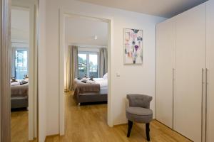 Ένα ή περισσότερα κρεβάτια σε δωμάτιο στο Staufner Hof Ferienwohnung