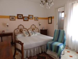 Postel nebo postele na pokoji v ubytování Sa Chessa B&B