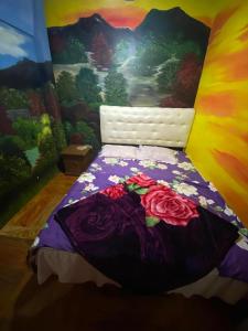 Postel nebo postele na pokoji v ubytování anemon dieng