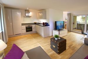 Η κουζίνα ή μικρή κουζίνα στο Staufner Hof Ferienwohnung