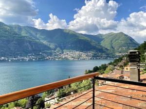 a view of a body of water with mountains at Holiday home with lake-view -Breck&fest in Blevio