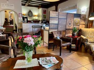Posezení v ubytování Logis Hôtel des Causses