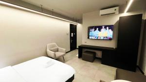 TV a/nebo společenská místnost v ubytování A In Hotel Atistar