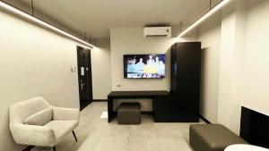 TV a/nebo společenská místnost v ubytování A In Hotel Atistar
