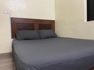 Postel nebo postele na pokoji v ubytování KB Guesthouse