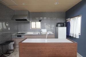 Kuchyň nebo kuchyňský kout v ubytování Fun Dog Villa Nasu -ファンドッグ ヴィラ那須 -