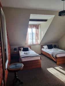 Posteľ alebo postele v izbe v ubytovaní Gościniec Oaza Sorkwity + 37 fotografií