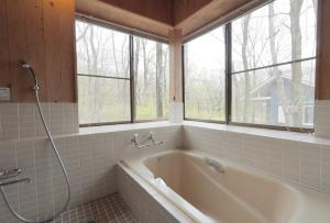 Koupelna v ubytování Fun Dog Villa Nasu -ファンドッグ ヴィラ那須 -