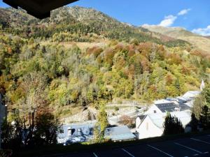 arial view of a mountain with houses and trees at Résidence Neouvielle - Appartement duplex dans le centre de Barèges MAE-8574 in Barèges