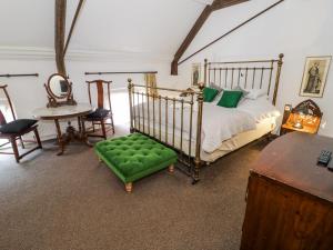 Ένα ή περισσότερα κρεβάτια σε δωμάτιο στο Chetwynd Lodge