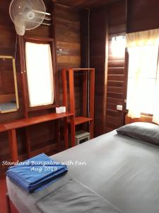 Postel nebo postele na pokoji v ubytování Haad Salad Resort