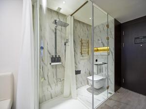 Koupelna v ubytování Hangzhou Futur Science andTechnoiogy CitiGO HuanGe Hotel