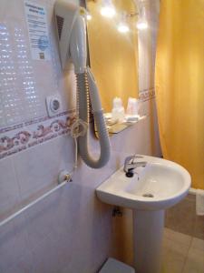 Koupelna v ubytování El Faisan C&R Hotel